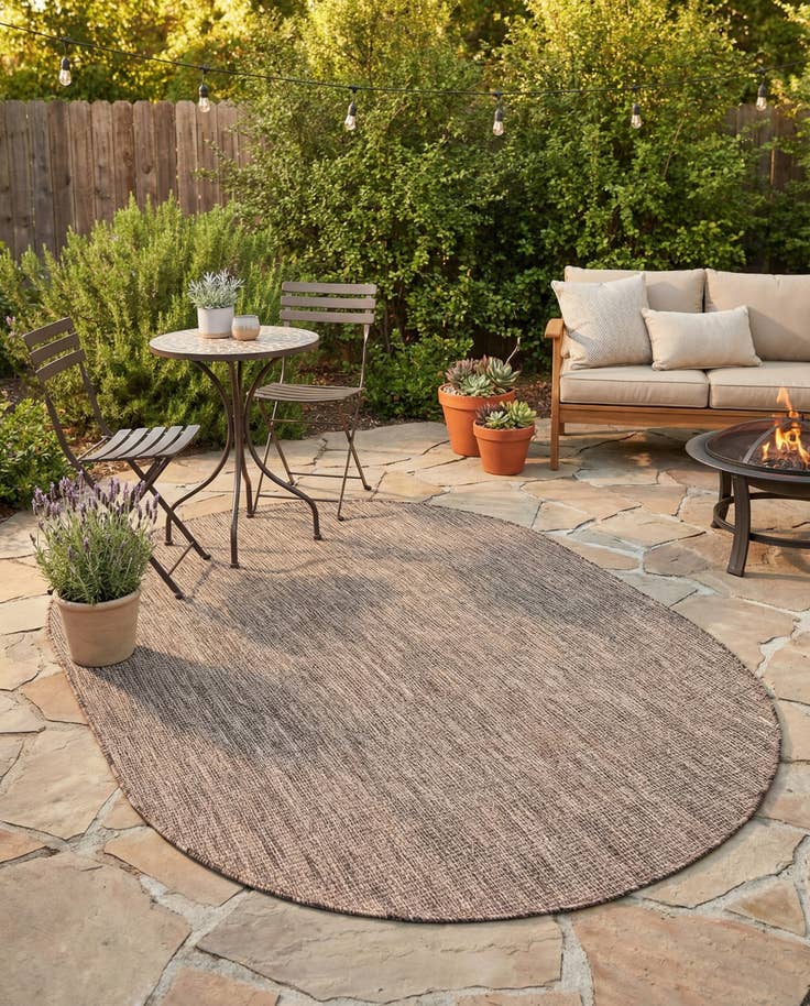 Detail image of 4' 1 x 6' 1 Easy-Clean Solid Indoor / Outdoor Oval Rug