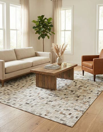 5' 7 x 7' 10 Cowhide Stocks Rug