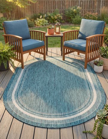 5' 3 x 8' Easy-Clean Border Indoor / Outdoor Oval Rug
