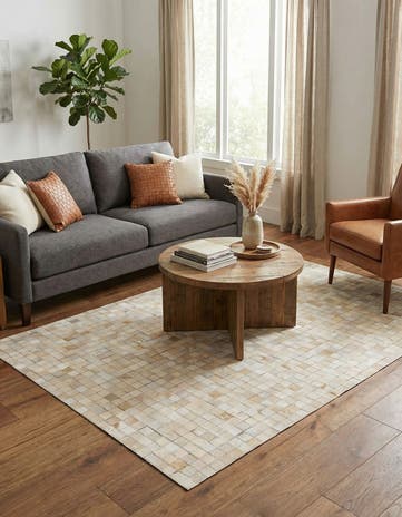 4' 1 x 5' 8 Cowhide Stocks Rug