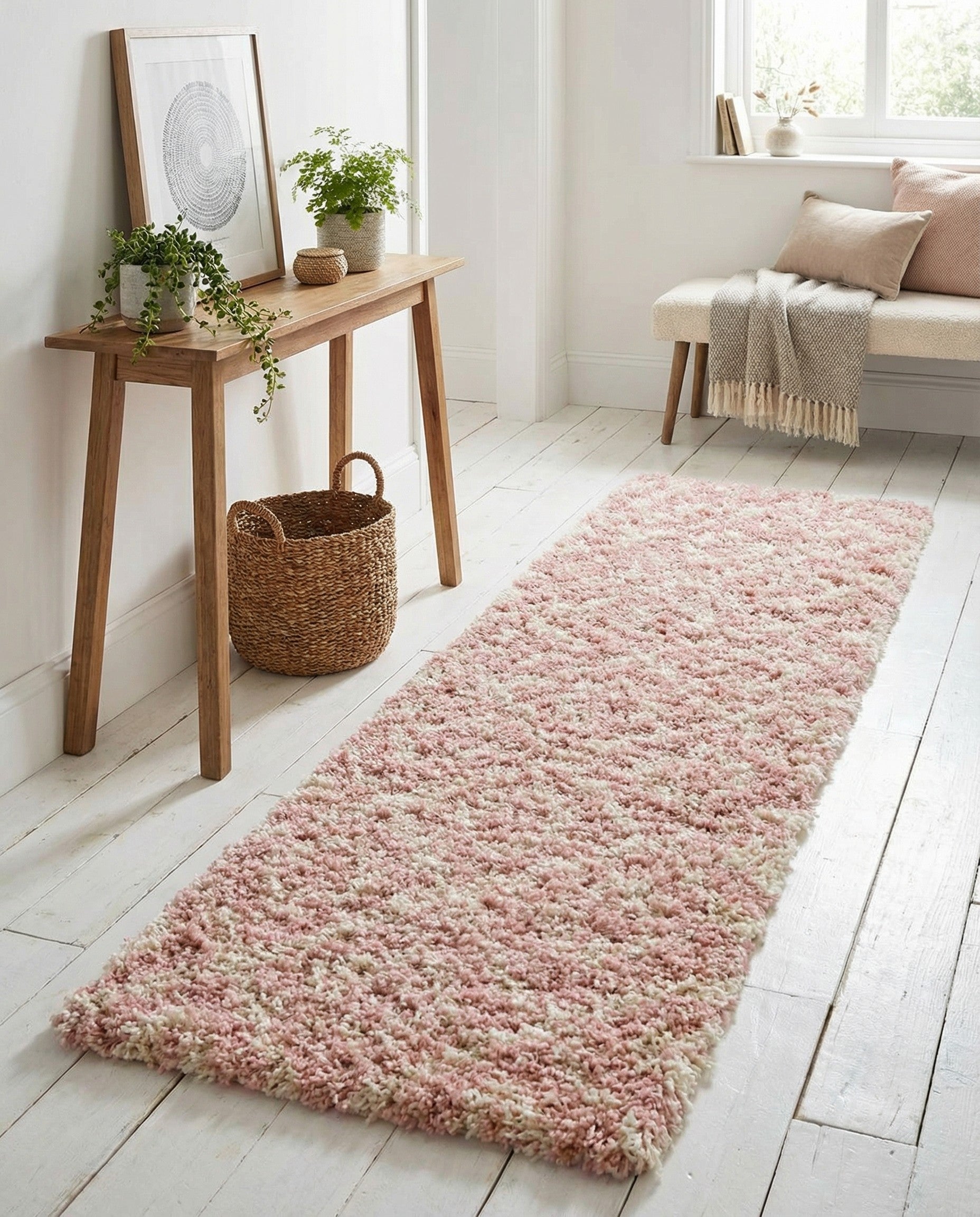 A soft pink and cream 8 ft runner rug with a modern trellis pattern and high-low shag pile, perfect for a hallway.
