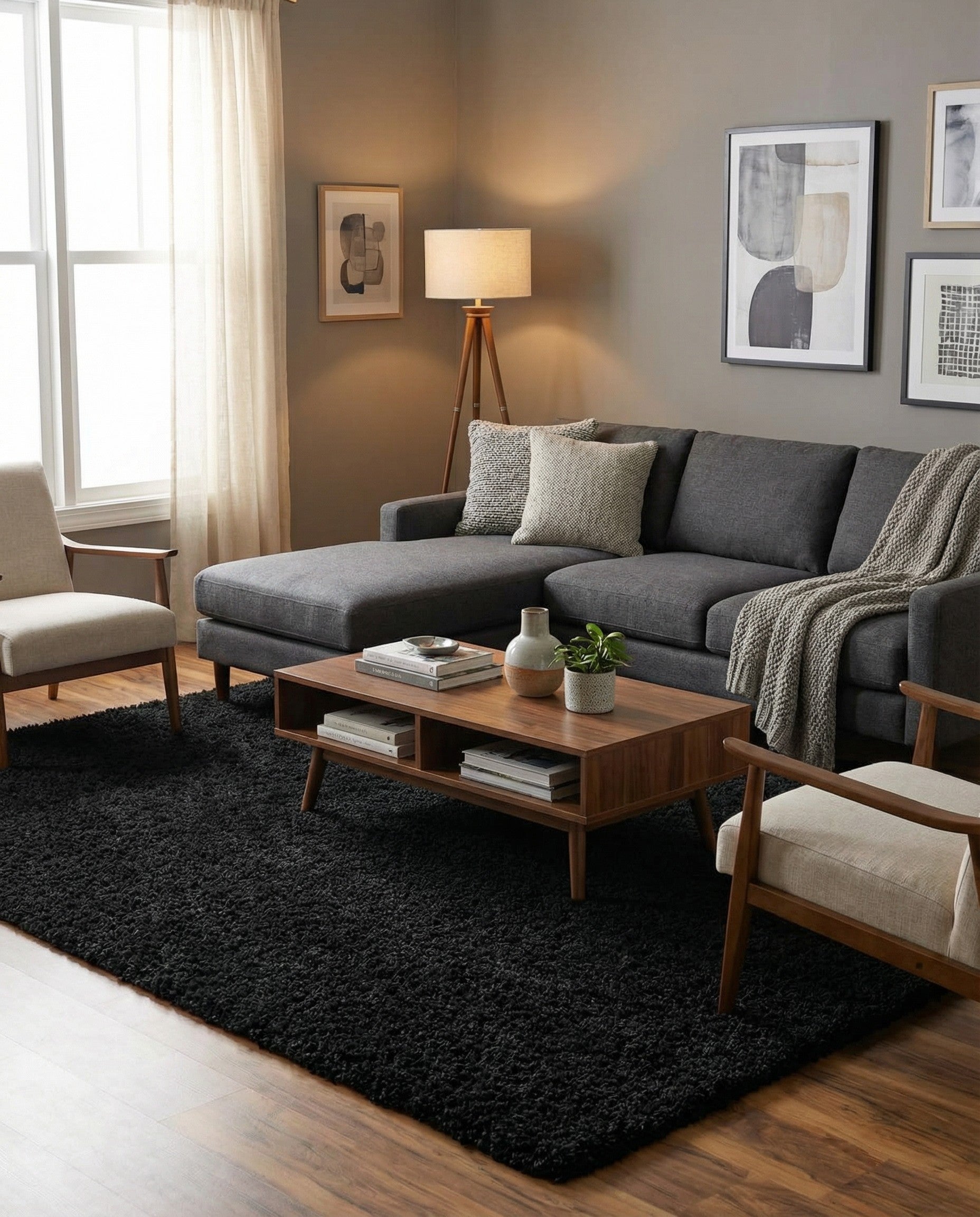 A plush, rectangular 8x11 black shag rug with a textured pile, perfect for a modern living room.