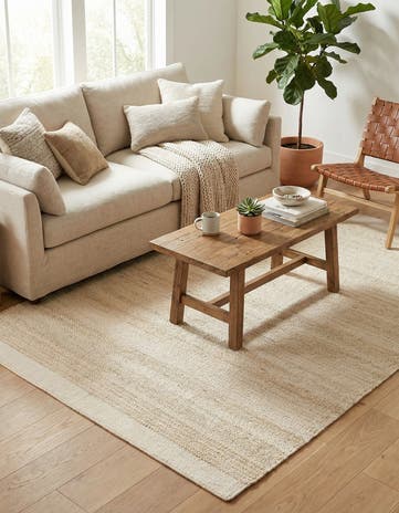 Ivory and White Hand Woven Lariat Rug