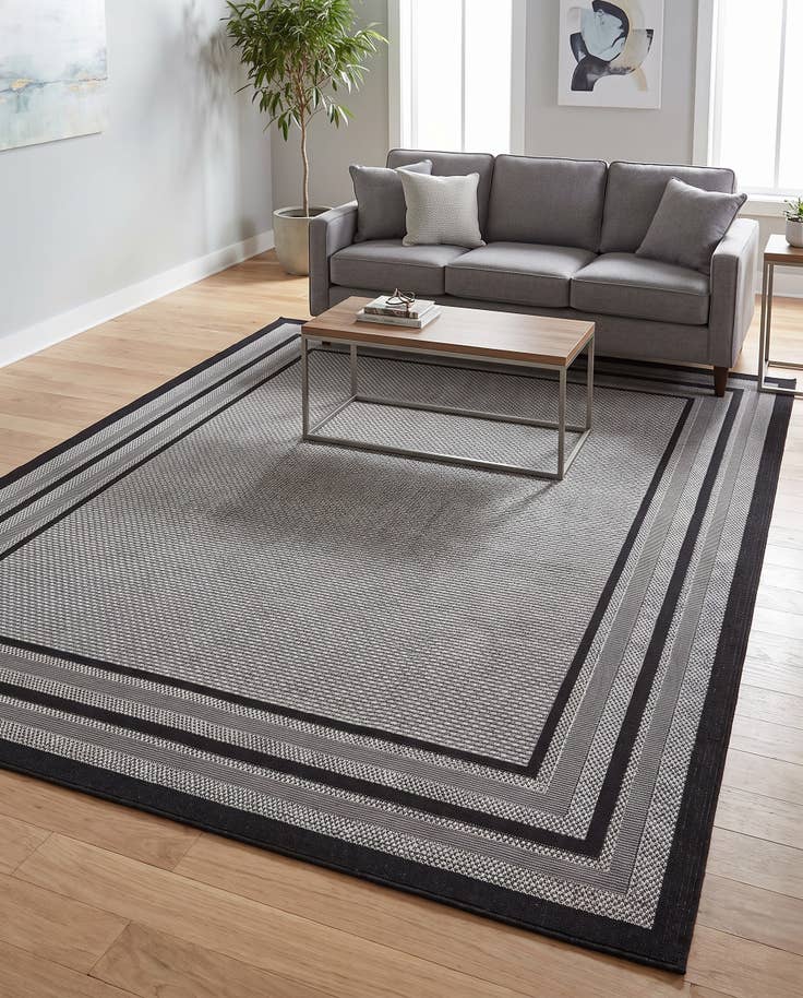 Detail image of 7' x 10' Easy-Clean Border Indoor / Outdoor Rug