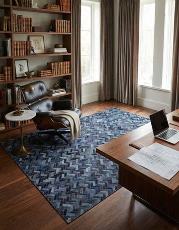 5' 2 x 8' 1 Cowhide Rug