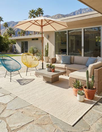 6' 1 x 9' Easy-Clean Jill Zarin Palm Springs Indoor / Outdoor Rug