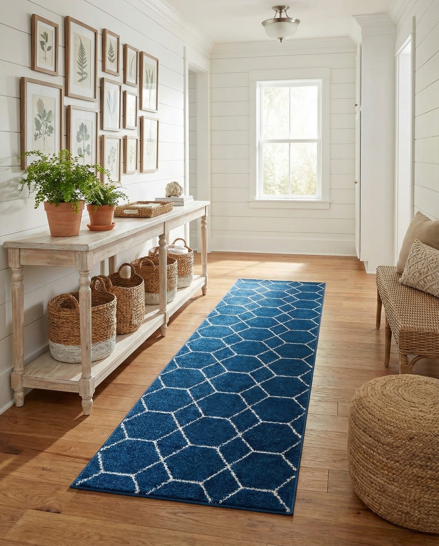 A 10 ft runner rug in deep navy blue with a repeating white modern trellis pattern, ideal for a hallway.