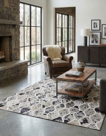 4' 11 x 7' 9 Cowhide Stocks Rug