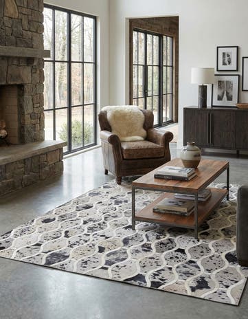 4' 11 x 7' 9 Cowhide Stocks Rug