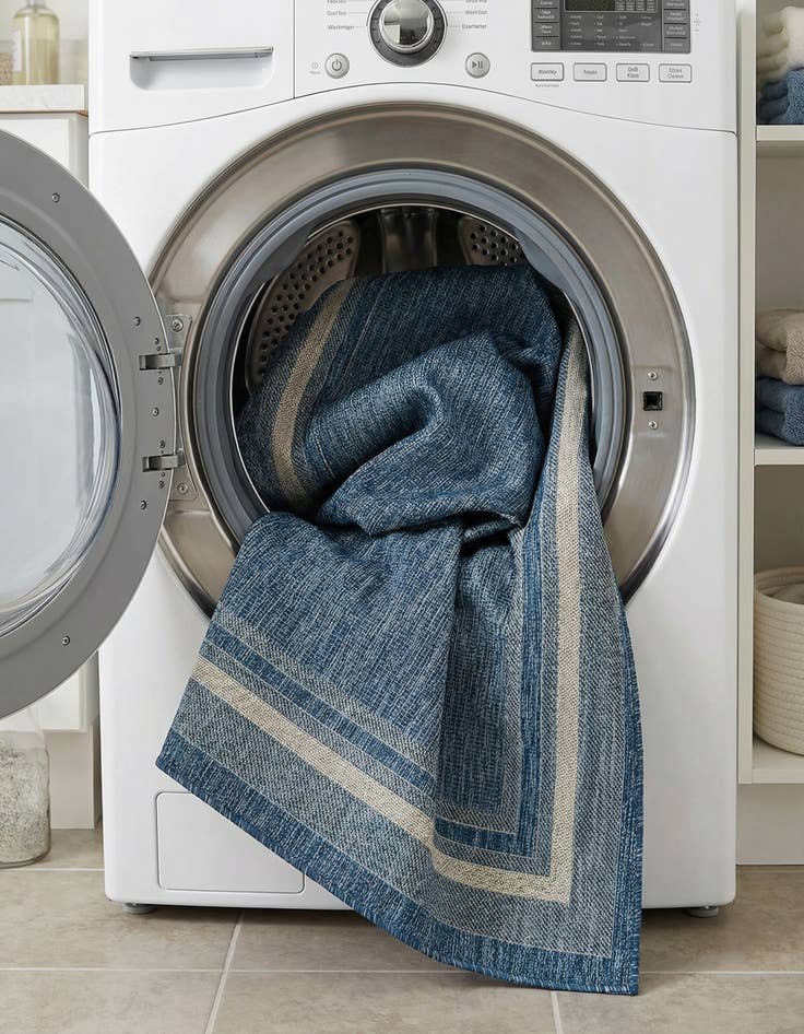 Detail image of  7' x 10'  Washable Border Indoor / Outdoor Rug