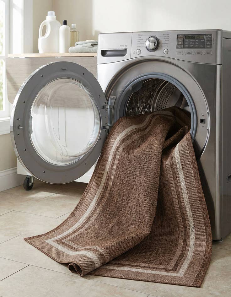 Detail image of  7' x 10'  Washable Border Indoor / Outdoor Rug