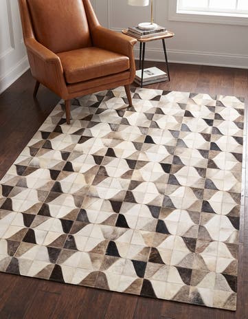 5' 2 x 7' 10 Cowhide Rug