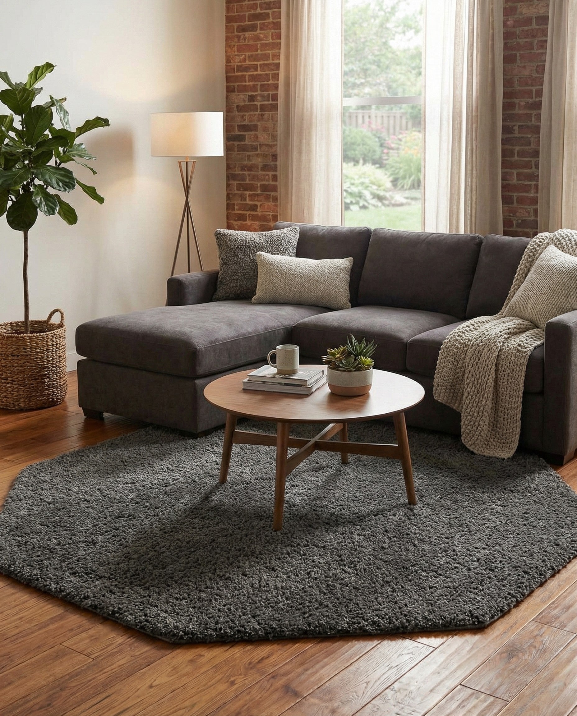 A soft, plush 7' 10 x 7' 10 octagon shag rug in a solid gray color, perfect for a modern living space.