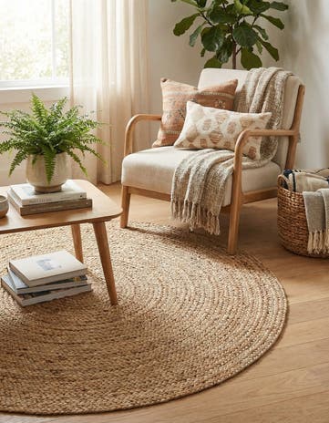 4' 1 x 4' 1 Handmade Braided Jute Round Rug
