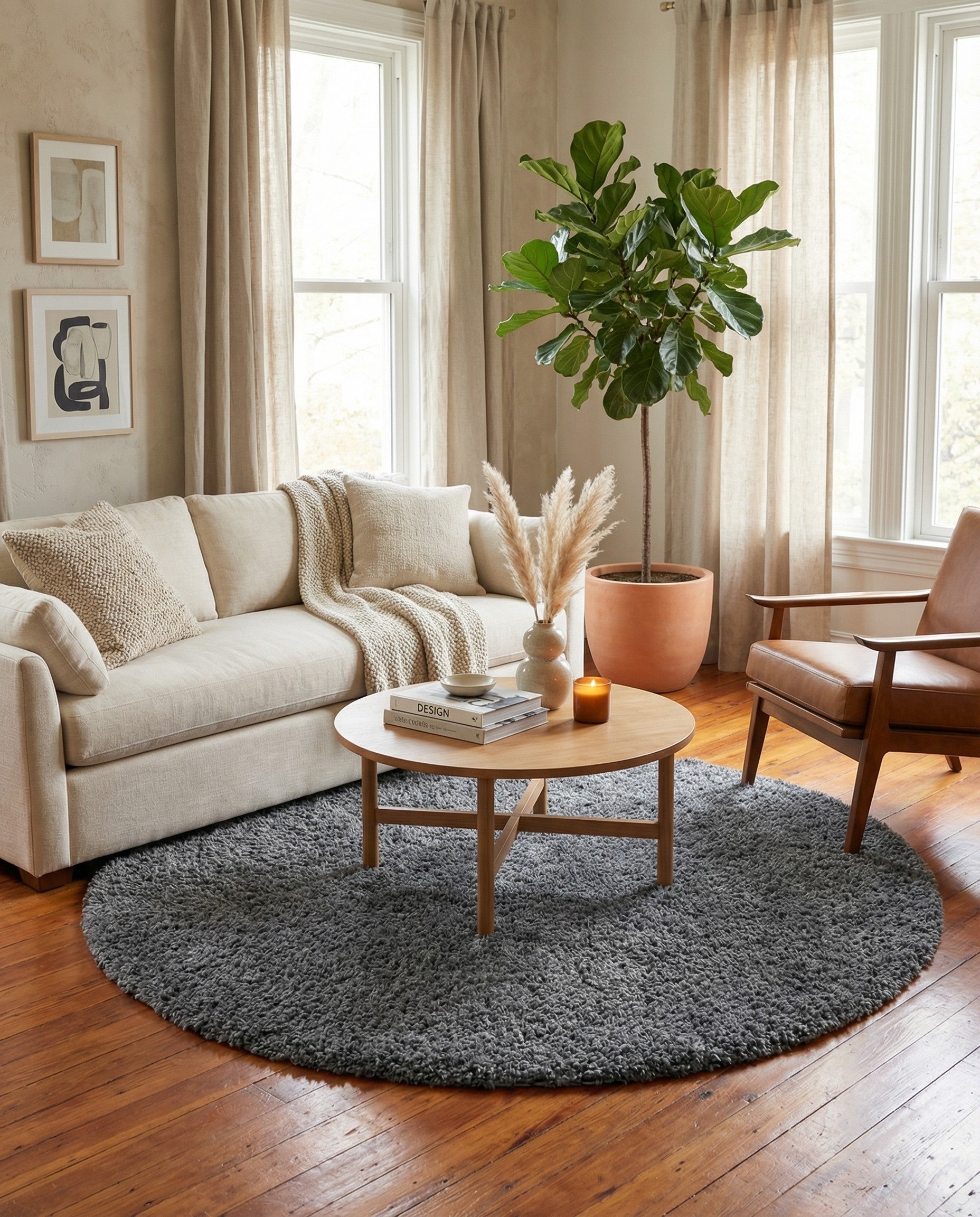 A soft, plush 7' 10 round gray shag rug with a textured pile, ideal for adding comfort to any indoor space.