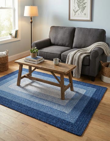 4' 1 x 6' 1 Handmade Hand Braided Wool Rug
