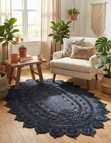 4' 1 x 6' 1 Handmade Braided Jute Oval Rug