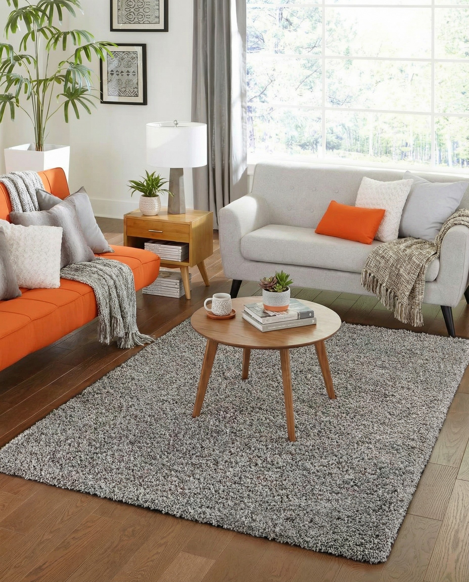 A 4x6 rectangular gray shag rug with a soft, textured pile, perfect for a modern living room or bedroom.