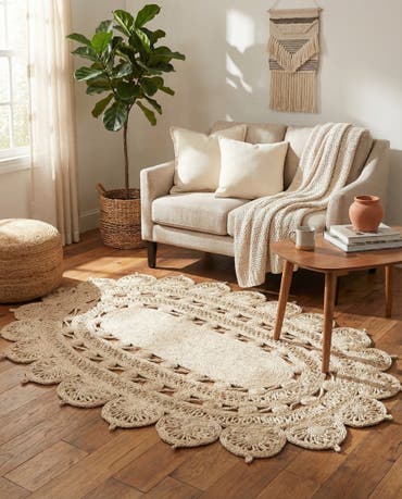  4' 1 x 6' 1  Hand Braided Jute Oval Rug