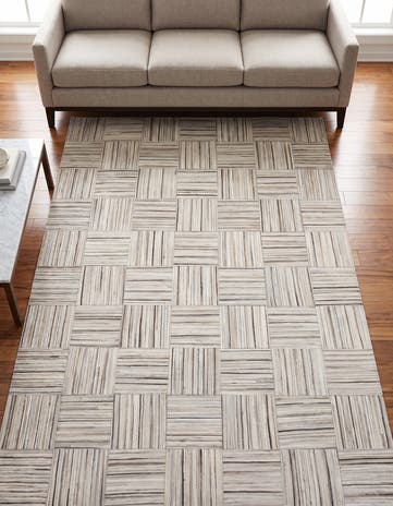 4' 11 x 8' 2 Cowhide Stocks Rug
