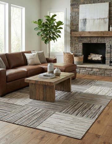 4' 11 x 8' 1 Cowhide Stocks Rug