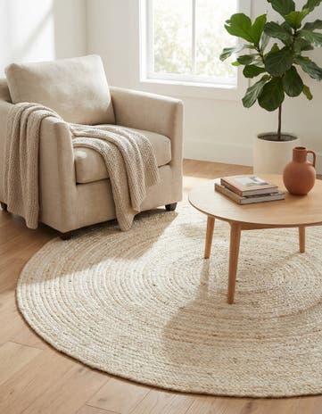 5' 1 x 5' 1 Handmade Braided Jute Round Rug