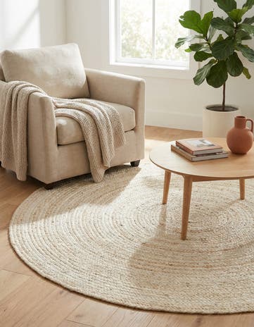 5' 1 x 5' 1 Handmade Braided Jute Round Rug