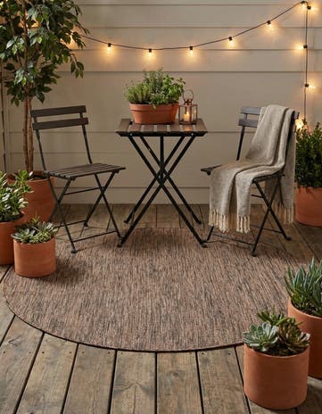 4' 1 x 4' 1 Easy-Clean Solid Indoor / Outdoor Round Rug