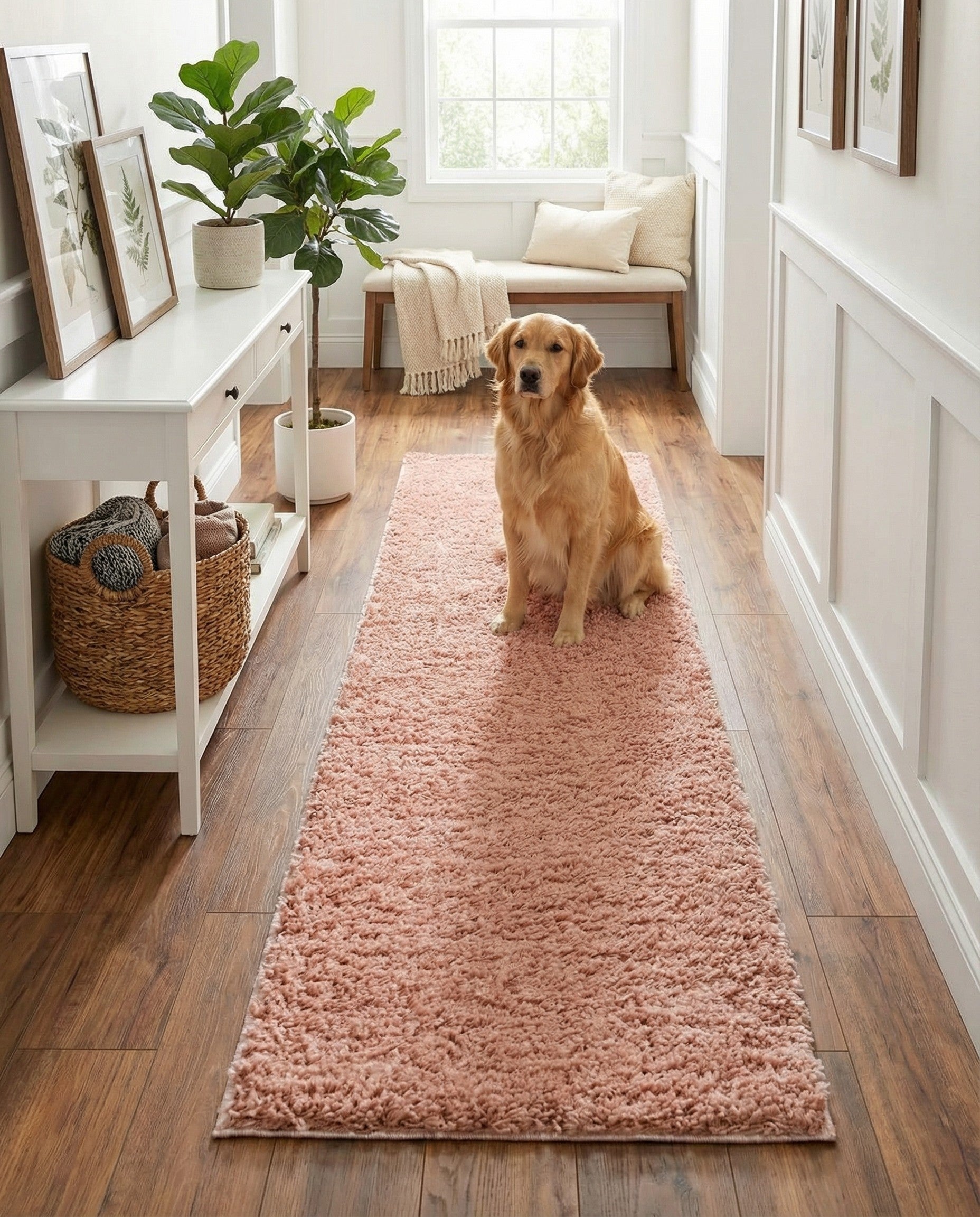 A long, rectangular 10 ft runner rug in a solid pink hue with a plush shag pile, ideal for a hallway.