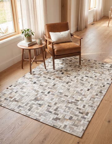 4' 8 x 6' 6 Cowhide Stocks Rug