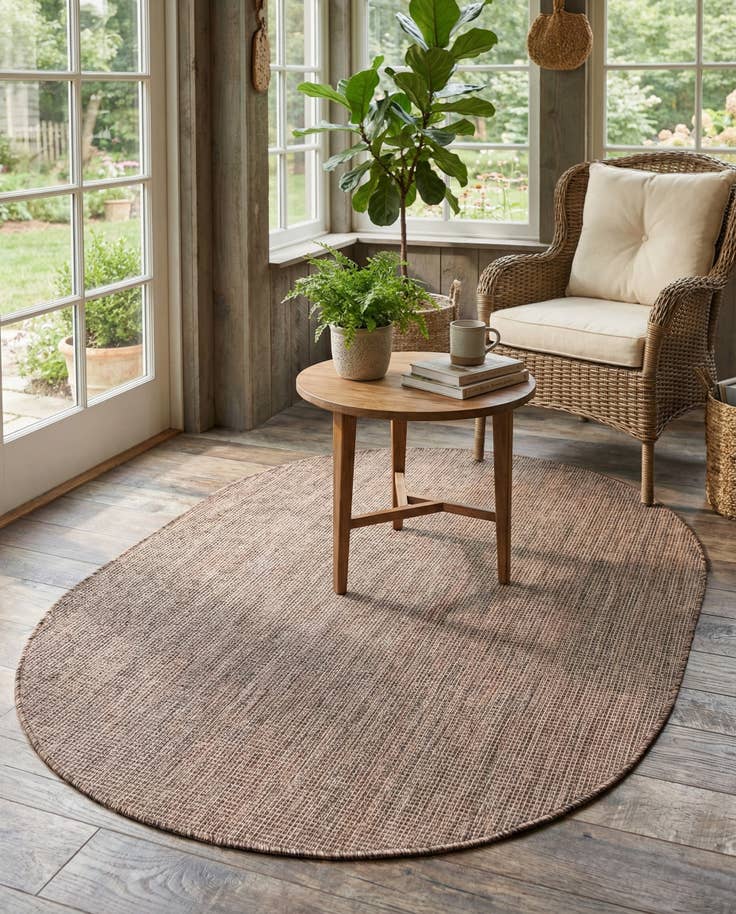 Detail image of 4' 1 x 6' 1 Easy-Clean Solid Indoor / Outdoor Oval Rug