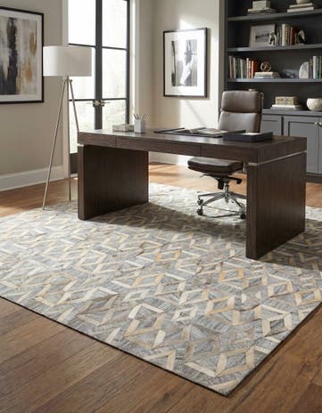 5' 2 x 7' 10 Cowhide Rug