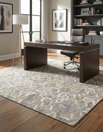 5' 2 x 7' 10 Cowhide Rug