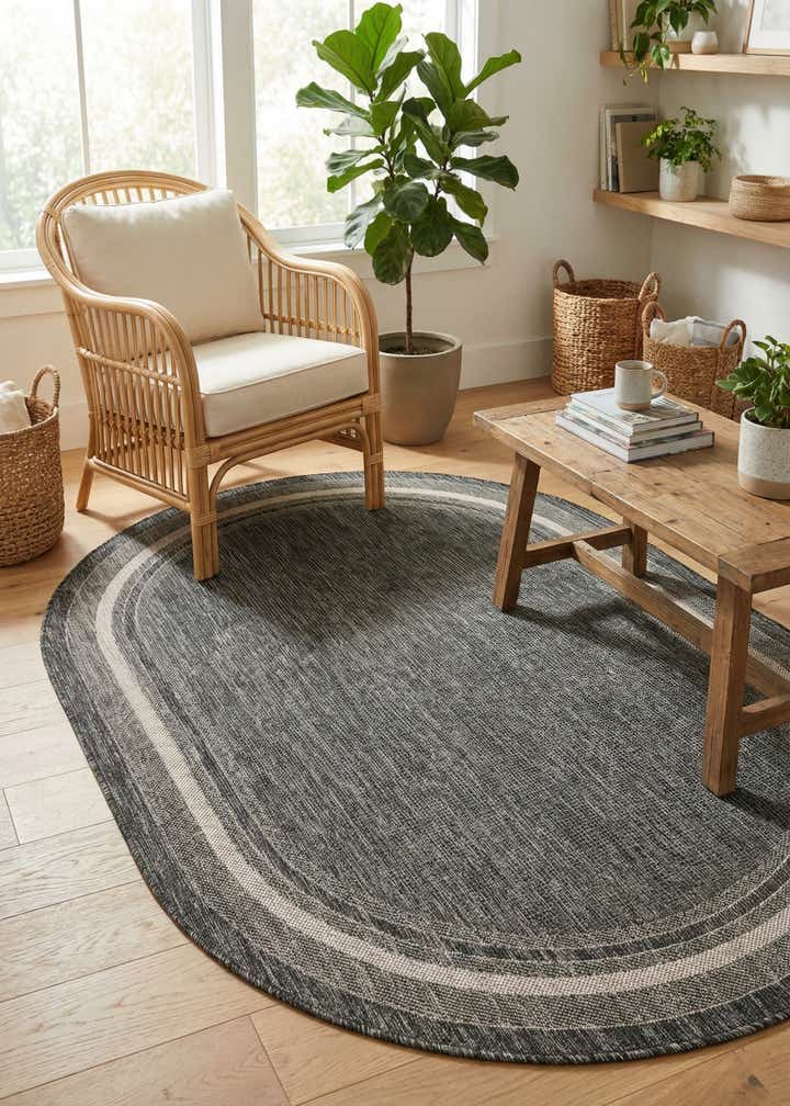 5' 3 x 8' Easy-Clean Border Indoor / Outdoor Oval Rug