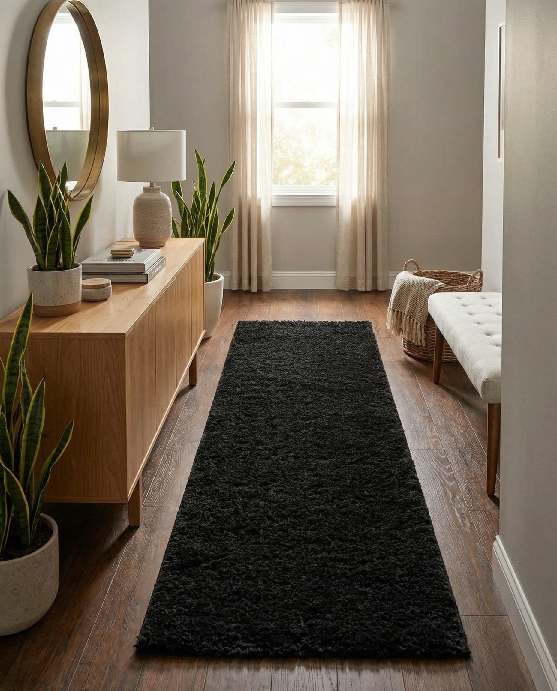 A long, rectangular 16 ft black shag runner rug with a textured pile, ideal for a hallway.