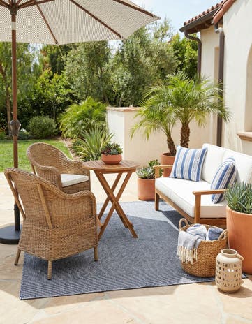 6' 1 x 9' Easy-Clean Jill Zarin Palm Springs Indoor / Outdoor Rug