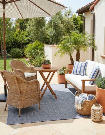 6' 1 x 9' Easy-Clean Jill Zarin Palm Springs Indoor / Outdoor Rug