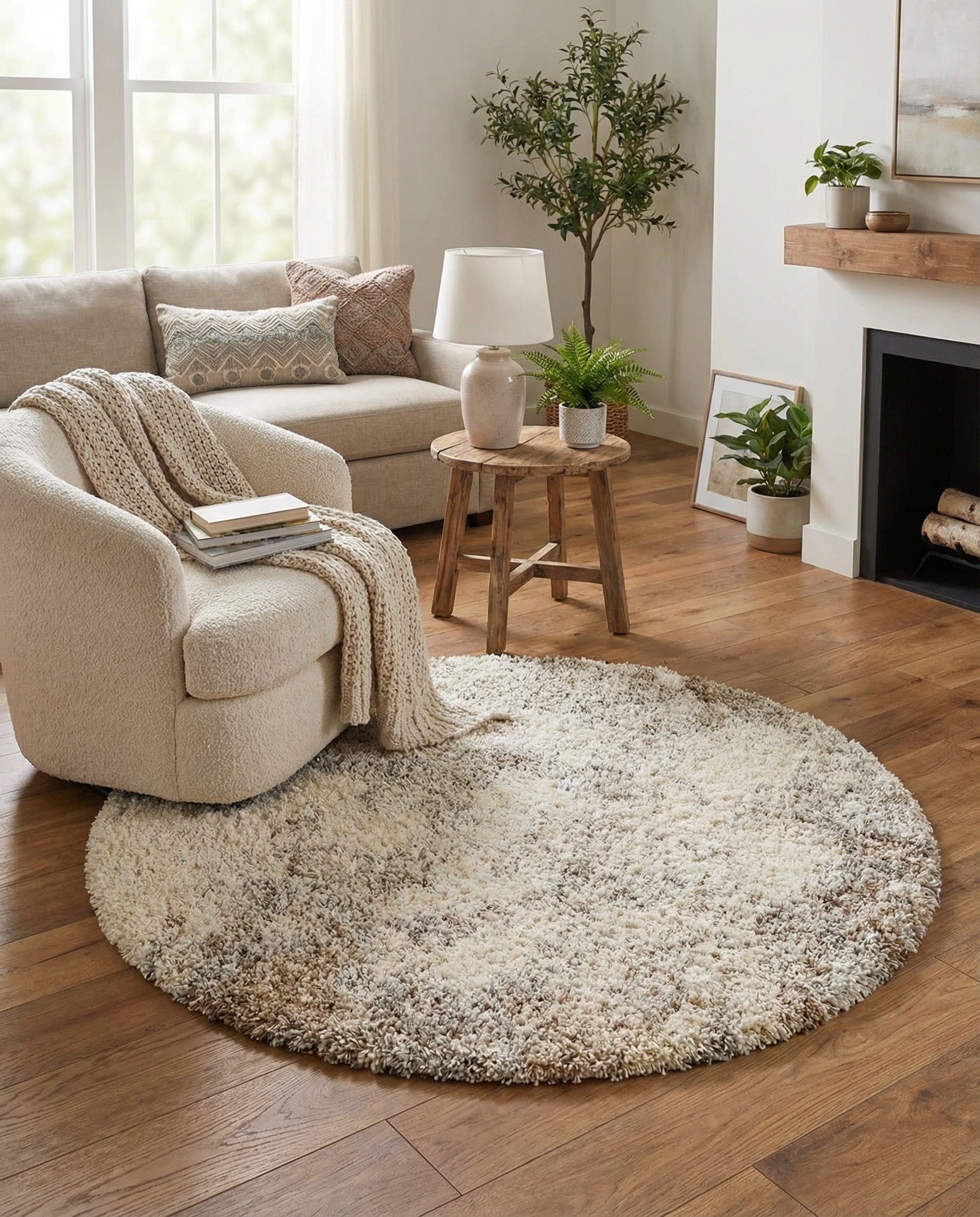 A 4-foot round shag rug featuring a textured, abstract pattern in shades of brown, tan, and cream, perfect for adding warmth to any indoor space.