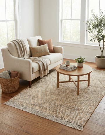 4' 1 x 6' 1 Handmade Braided Jute Rug