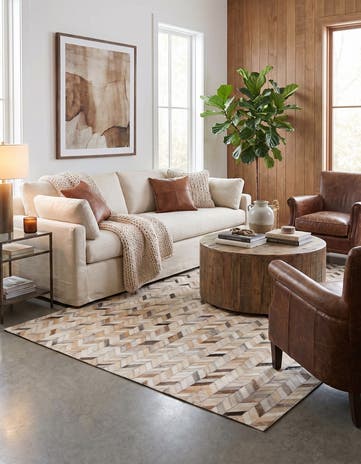 4' 8 x 6' 7 Cowhide Stocks Rug
