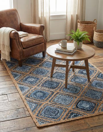 4' 1 x 6' 1 Handmade Braided Jute Rug