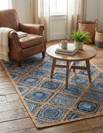 4' 1 x 6' 1 Handmade Braided Jute Rug
