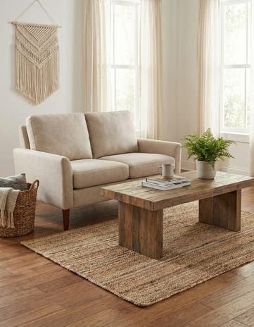 4' 1 x 6' 1 Handmade Braided Jute Rug
