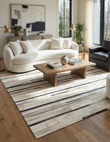 4' 11 x 7' 8 Cowhide - Patchwork Rug