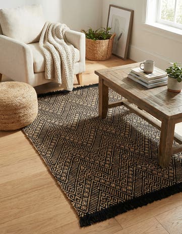 4' 1 x 6' 1 Handmade Braided Jute Rug