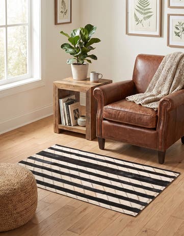 2' 1 x 3' 1 Cowhide Rug