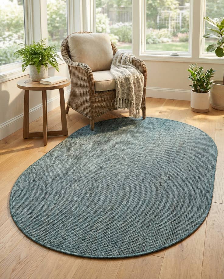 Detail image of 4' 1 x 6' 1 Easy-Clean Solid Indoor / Outdoor Oval Rug
