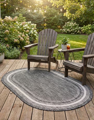 Black Easy-Clean Border Indoor / Outdoor Oval Rug