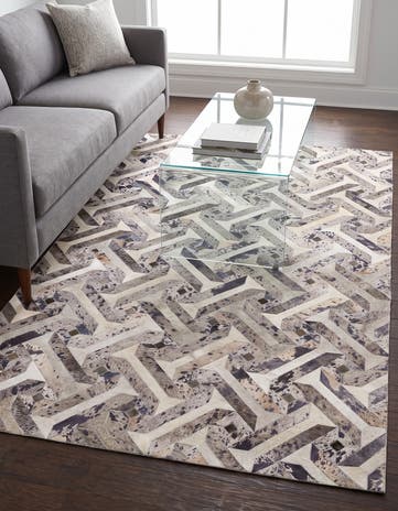 5' 2 x 8' 1 Cowhide Stocks Rug