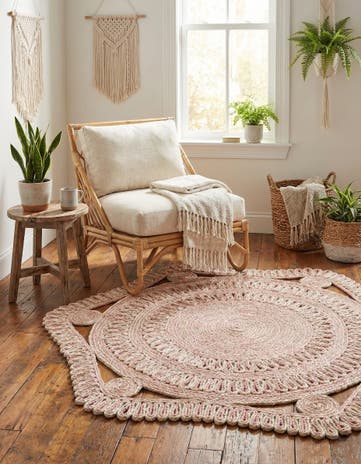 4' 1 x 4' 1 Handmade Braided Jute Round Rug
